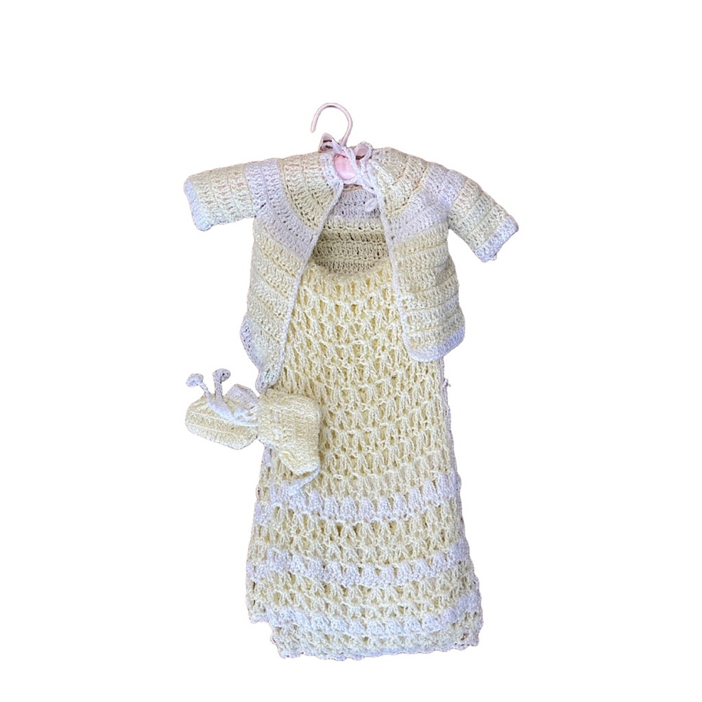 The cutest yellow and white knit baby set
